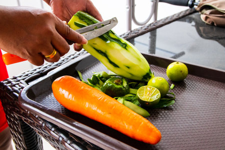 Cucumber peel as part of the preparation for later cookingの写真素材