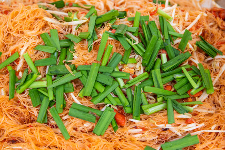 thai noodle vegetable dish for sale on the street