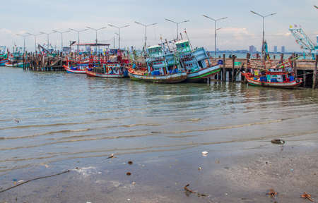 fishing boats at a pier in Thailand Southeast Asiaの写真素材