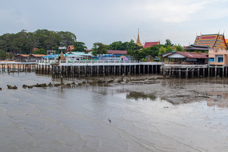 fishing boats at a pier in Thailand in Southeast Asiaの写真素材