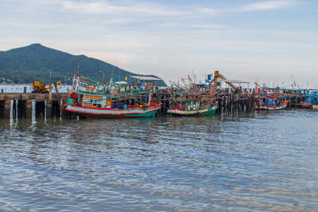 fishing boats at a pier in Thailand Southeast Asiaの写真素材