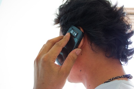 a man is speaking the telephone and the lover