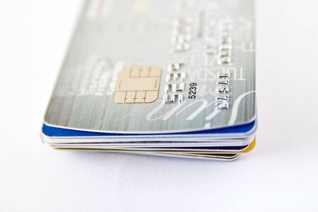 Stack of credit card on white backgroundの写真素材