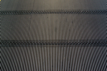 moving escalator in the modern airport terminal