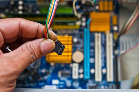 Technician repairing computer hardware in the labの写真素材