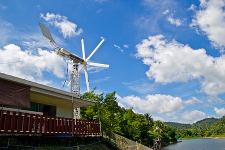 windmills against a blue sky, alternative energy sourceの写真素材