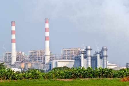 gas turbine electrical power plant with high voltage transmission lines and pylons, Thailandのeditorial素材