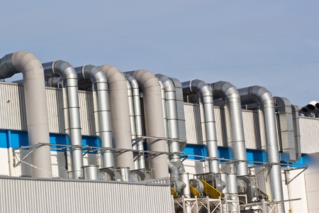 Ventilation pipes of an air conditionon a roof top.