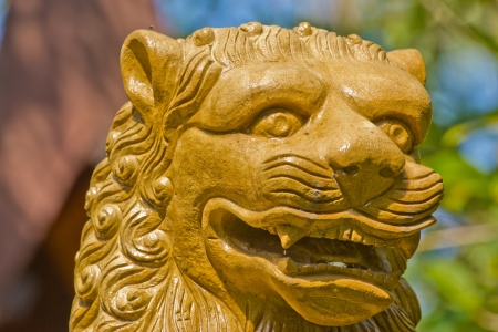 stone lion at thailandの写真素材
