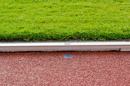 New running track and grandstand.