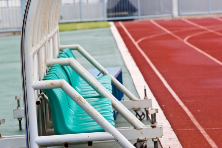 Coach and reserve benches in a soccer fieldの写真素材