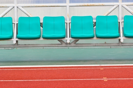 Coach and reserve benches in a soccer fieldの写真素材