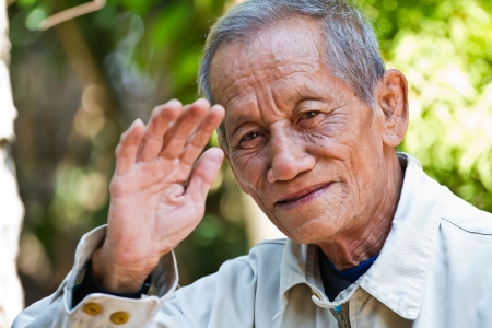 asian old senior man candid portraitの写真素材