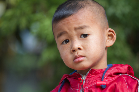 asian boy on a cold winter dayの写真素材