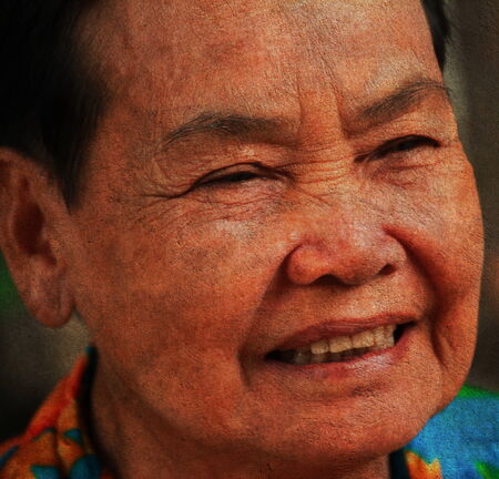 closeup portrait of happy old womanの写真素材
