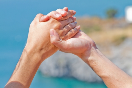 Two hands over thai seaの写真素材