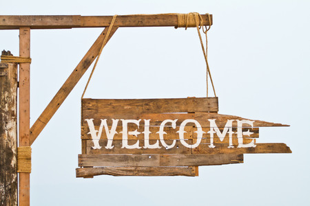 welcome sign hanging on ropeの写真素材