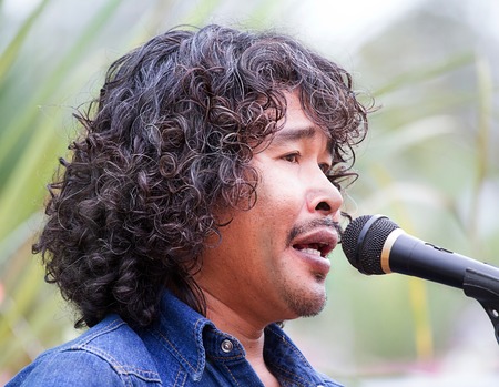 street performers with guitar, with folksong backgroundのeditorial素材