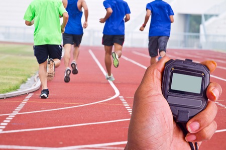 Cropped image of  runner on competitive running