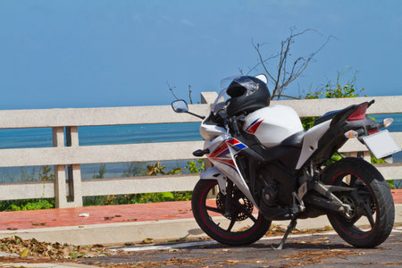 motorcycle traveler on thai sea