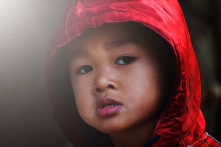 Happy little boy in winter clothesの写真素材