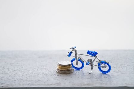 Closeup figure bicycle model with soft focus, vintage style.