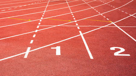 number one in red  running track on the athletic stadium