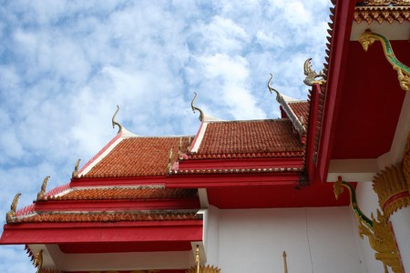 Beautiful blue eyes clear over the roof of the ancient temples in the canteen central Phuket...