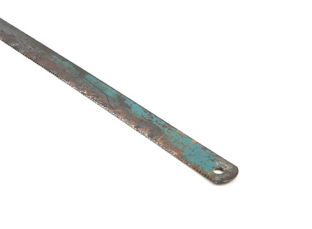 old Junior hacksaw blade isolated on white backgroundの写真素材