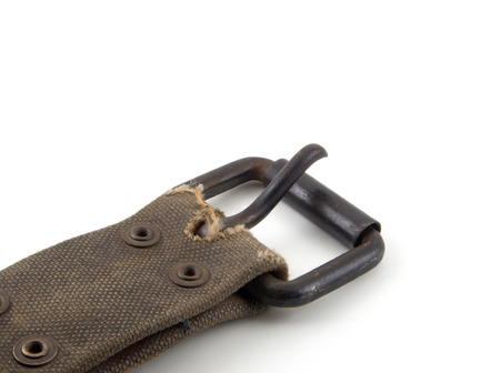 Old strap belt on white backgroundの写真素材