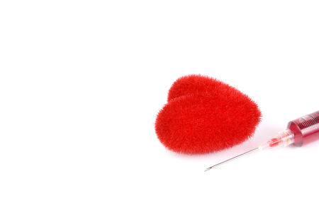 red heart and syringの写真素材