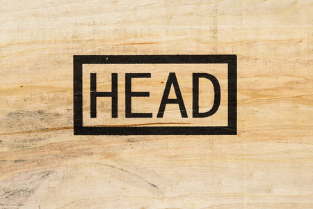 Black fragile symbol on wood , head symbolの写真素材