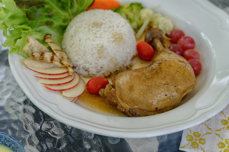 fried chicken with rice and fresh saladの写真素材