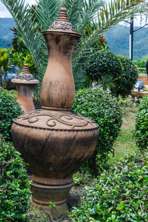 Carved beautiful pottery decoration in the garden の写真素材