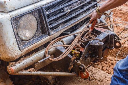 Man with towing rope near carの写真素材