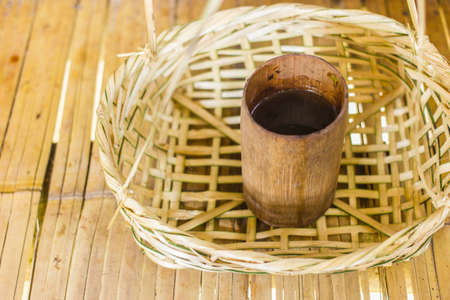 Tea in bamboo cupの写真素材
