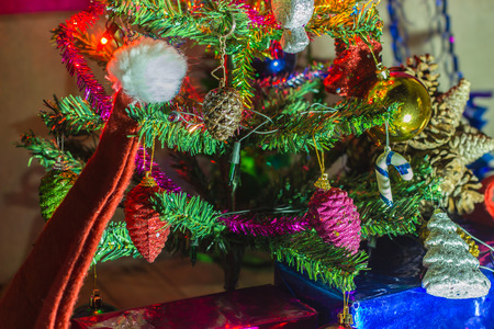 Beautifully decorated Christmas tree with many presents under it.の写真素材