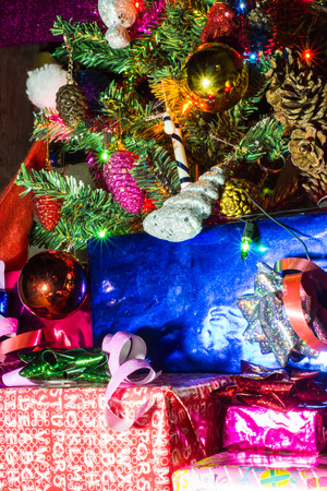 Beautifully decorated Christmas tree with many presents under it.の写真素材