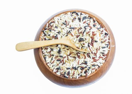 Mix rice on wooden spoon on white wood background. Product of Thailand, Asia.の写真素材