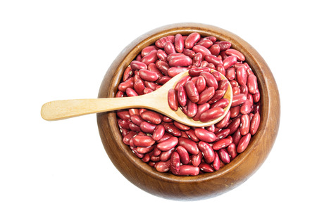 Red adzuki bean on wooden spoon in wooden bowl isolate on background. Product of Thailand, Asia.の写真素材