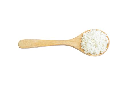 White rice on wooden spoon isolated on white  background. Product of Thailand, Asia.の写真素材