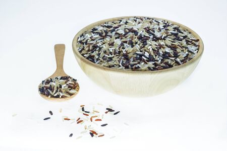 Mix rice on wooden spoon in a wooden bowl. Product of Thailand, Asia.の写真素材