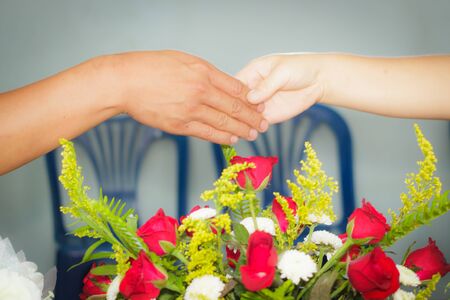 Just married - Two hand of man and woman in one unionの写真素材