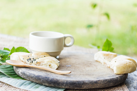 coffee cup with croissantの写真素材