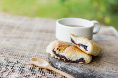 coffee cup with croissantの写真素材