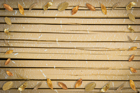 dry leaf frame on bamboo fence backgroundの写真素材