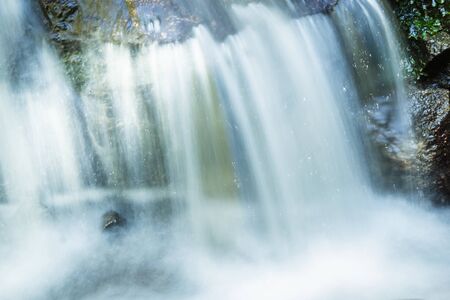 Nice waterfall in sunny dayの写真素材