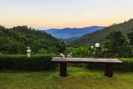 a lonely bench on the Green mountain, Morningの写真素材