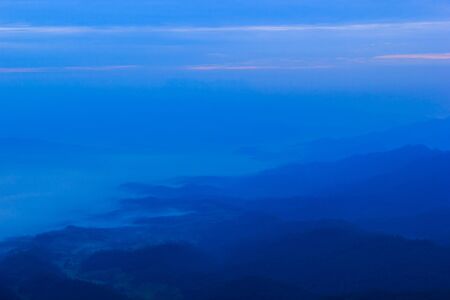Blue mountain with blue sky and clouds backgroundの写真素材