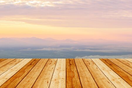 wood terrace with view from top of mountain in the morning for background.の写真素材